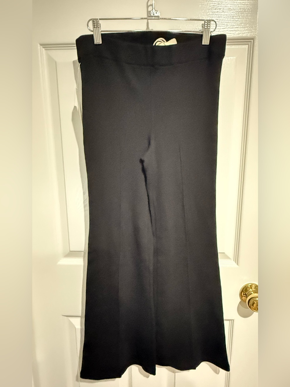 DONNI. Black Rib Kick Flare Pants